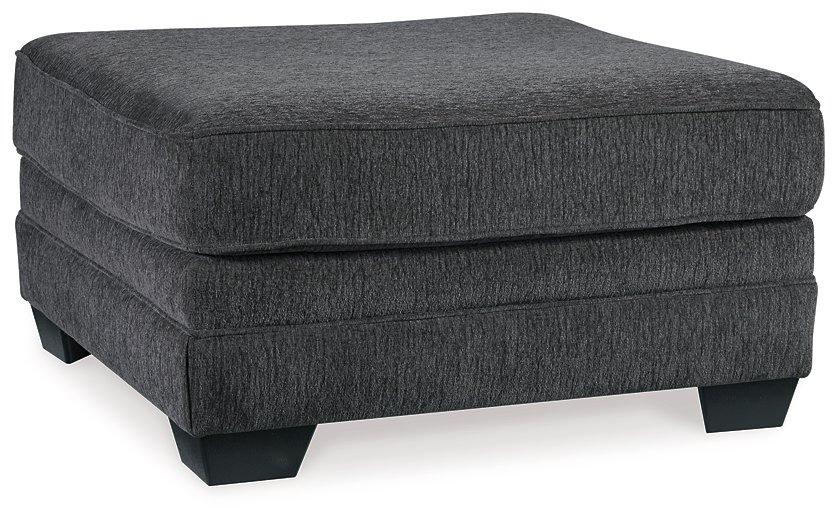 Oversized Ashley Furniture Tracling Ottoman with plush fabric and modern design, perfect for living room or lounge space.