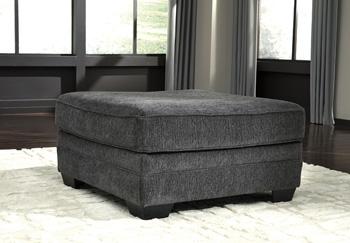 Oversized Ashley Furniture Tracling Ottoman with plush fabric and tufted top, perfect for living room decor.