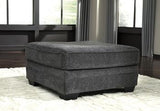Oversized Ashley Furniture Tracling Ottoman with plush fabric and tufted top, perfect for living room decor.