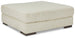 Lindyn oversized accent ottoman by Ashley Furniture with plush fabric and tufted top, serving as a stylish footrest or accent piece.