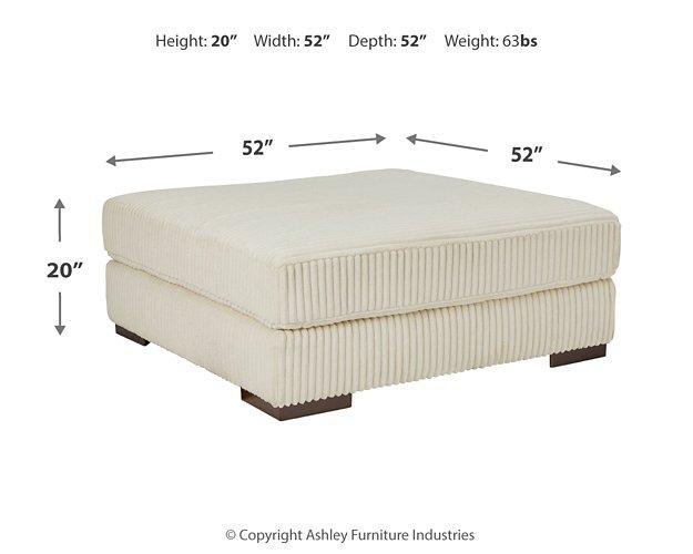 Lindyn oversized accent ottoman by Ashley Furniture with plush fabric and modern design, perfect as a stylish living room accent piece.