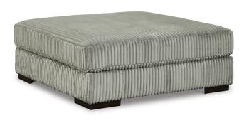 Oversized Ashley Furniture Lindyn accent ottoman with plush fabric and modern design, perfect for living room décor.
