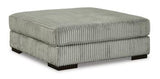 Oversized Ashley Furniture Lindyn accent ottoman with plush fabric and modern design, perfect for living room décor.