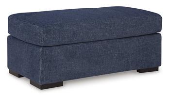 Ashley Furniture Evansley Ottoman with plush fabric and wooden legs, perfect for living room or bedroom decor.