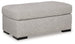 Ashley Furniture Evansley Ottoman showing a plush fabric surface with wooden legs, perfect for living room or seating area.