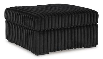 Oversized Midnight-Madness Ashley Furniture accent ottoman with plush fabric and modern design, perfect for living room decor.