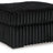 Oversized Midnight-Madness accent ottoman by Ashley Furniture with plush fabric and modern design, suitable for living rooms or seating areas.