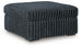 Ashley Furniture Midnight-Madness oversized accent ottoman with plush fabric and sturdy wooden legs, shown from an angled view.