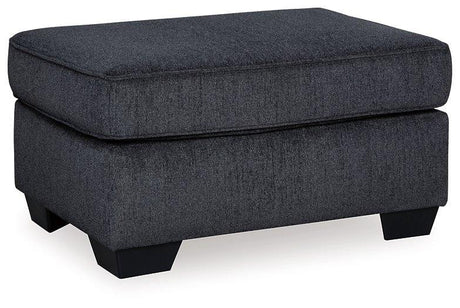 Ashley Furniture Altari Ottoman showing a stylish fabric-covered ottoman with wooden legs, ideal for living room decor.