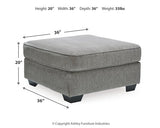 Oversized Altari accent ottoman by Ashley Furniture with plush fabric and tufted top, serving as a stylish living room accent piece.