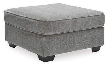 Oversized Ashley Furniture Altari accent ottoman with plush fabric and tufted top, perfect for living room decor.