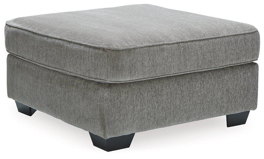 Oversized Ashley Furniture Altari accent ottoman with plush fabric and modern design, perfect for living room decor.
