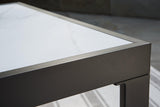 Outdoor cocktail table by Ashley Furniture, Beachloft style, with a wooden top and metal frame, perfect for patio or outdoor lounging.