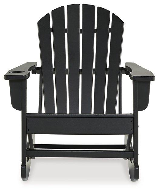 Ashley Furniture Sundown Treasure outdoor rocking chair with wooden frame and cushioned seat, perfect for relaxing on the patio.