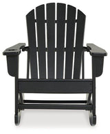 Ashley Furniture Sundown Treasure outdoor rocking chair with wooden frame and cushioned seat, perfect for relaxing on the patio.