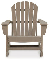 Ashley Furniture Sundown Treasure outdoor rocking chair with wooden frame and cushioned seat for comfortable outdoor lounging.
