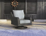 Outdoor swivel lounge chair with cushion by Ashley Furniture, featuring a stylish design ideal for outdoor relaxation.