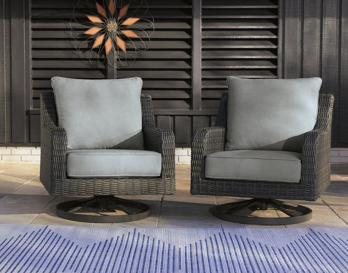 Outdoor swivel lounge chair with cushion from Ashley Furniture, designed for comfortable outdoor relaxation and stylish patio decor.