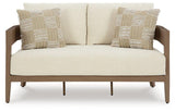 Ashley Furniture Serene Bay outdoor loveseat with beige cushions, featuring a sturdy metal frame and comfortable seating for outdoor spaces.