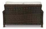 Outdoor loveseat by Ashley Furniture with plush cushions and durable frame, perfect for outdoor patio seating.