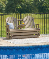 Ashley Furniture Hyland Wave outdoor glider loveseat with cushioned seats and armrests, perfect for outdoor relaxation.