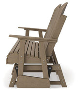 Outdoor loveseat by Ashley Furniture, Hyland Wave Glider Loveseat, featuring cushioned seating and a stylish outdoor design.