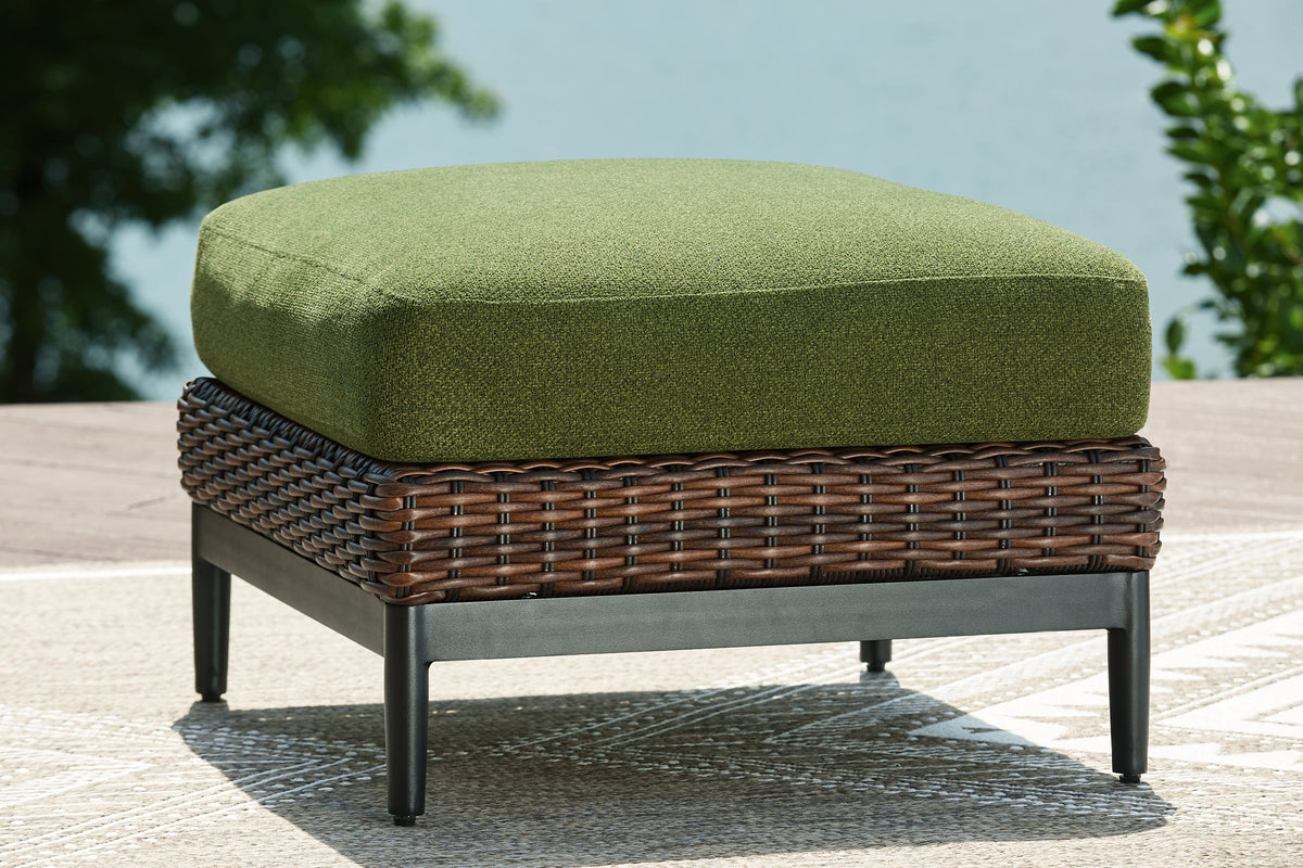 Outdoor ottoman with cushion from Ashley Furniture's Horizon Hall collection, featuring a stylish and durable design.