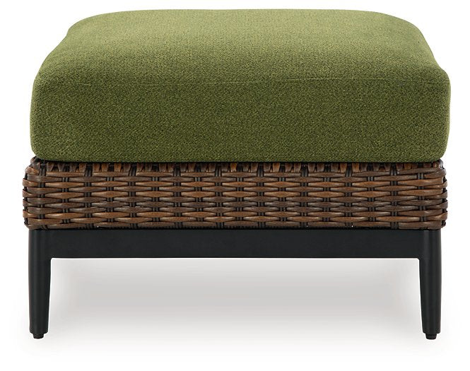 Outdoor Ottoman with cushion from Ashley Furniture Horizon Hall collection, featuring a stylish, weather-resistant design for outdoor seating.