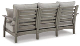Ashley Furniture Visola outdoor sofa with cushion, stylish outdoor seating with comfortable cushions, perfect for patio or garden.