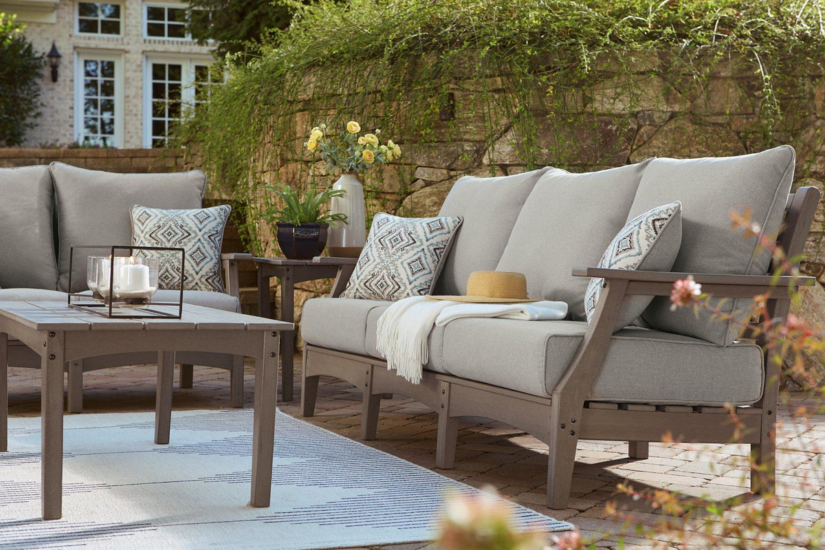 Ashley Furniture Visola outdoor sofa with cushion, stylish outdoor seating with comfortable cushions for patio relaxation