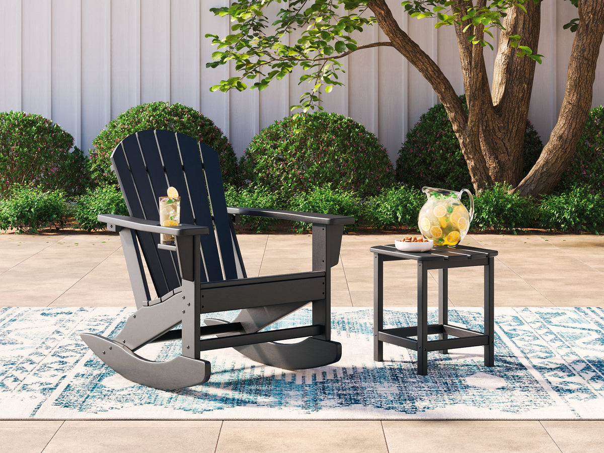 Ashley Furniture Sundown Treasure outdoor seating set with cushioned chairs and a matching table on a patio.
