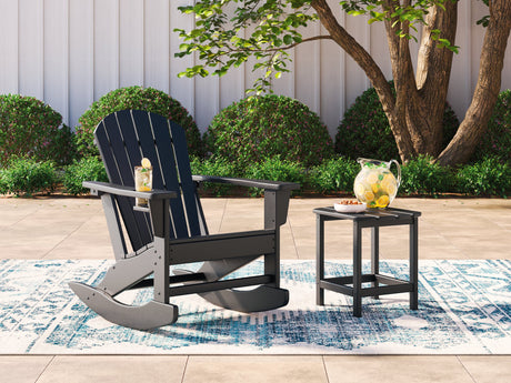 Ashley Furniture Sundown Treasure outdoor seating set with cushioned chairs and a matching table on a patio.