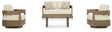 Outdoor seating set by Ashley Furniture featuring cushioned chairs and a matching table in a serene bay setting.