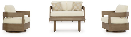 Outdoor seating set by Ashley Furniture featuring cushioned chairs and a matching table in a serene bay setting.