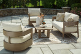 Ashley Furniture Serene Bay outdoor seating set with cushioned chairs and glass-top table in a patio setting.