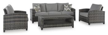 Outdoor seating set by Ashley Furniture with a sofa, chairs, and table, perfect for patio outdoor relaxation.