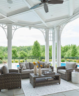 Outdoor Ashley Furniture Oasis Court patio set with sofa, chairs, and table for stylish outdoor seating and entertaining.