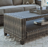 Ashley Furniture Oasis Court outdoor seating set with sofa, chairs, and table for patio or garden, weather-resistant design