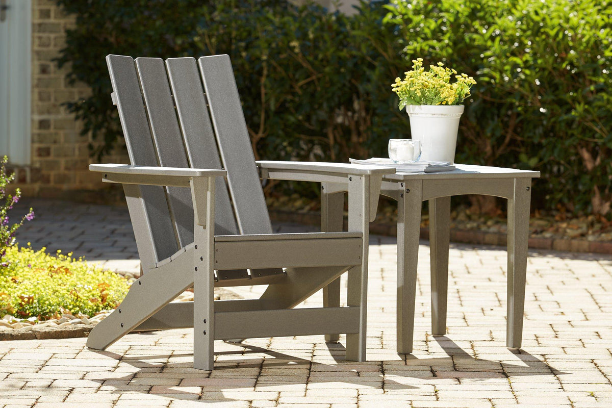 Ashley Furniture Visola outdoor Adirondack chair and end table set, ideal for patio seating and outdoor relaxation.