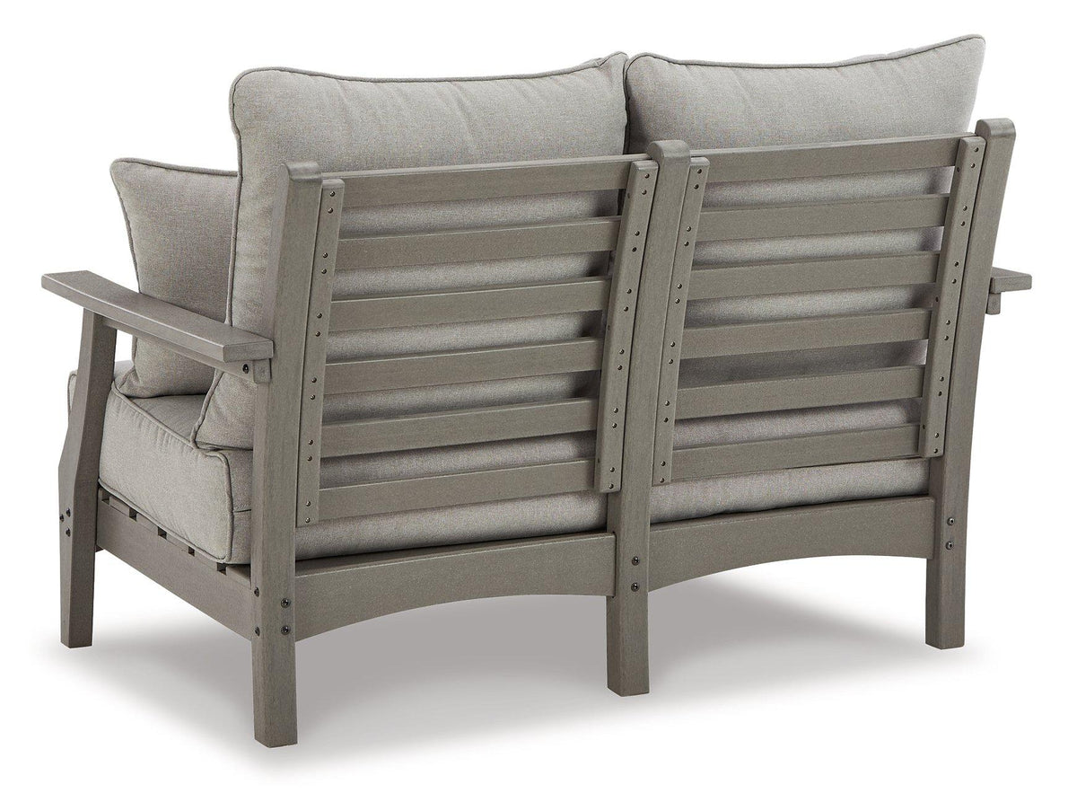 Ashley Furniture Visola outdoor seating set with sofa, loveseat, and coffee table, featuring weather-resistant cushions and stylish design.