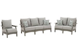 Outdoor Ashley Furniture Visola outdoor seating set with cushioned chairs and table, ideal for patio relaxation and outdoor gatherings.