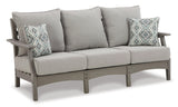 Outdoor Ashley Furniture Visola outdoor seating set with cushioned chairs and a matching table, ideal for patio relaxation.