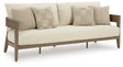 Ashley Furniture Serene Bay outdoor sofa with cushions, featuring a stylish frame and plush seating for outdoor relaxation.