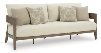 Ashley Furniture Serene Bay outdoor sofa with cushion, stylish weather-resistant outdoor seating for patio or garden.