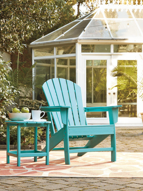 Ashley Furniture Sundown Treasure outdoor seating set with a table and chairs, perfect for patio relaxation.