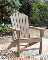 Outdoor table set from Ashley Furniture with a glass-top table and cushioned chairs, part of the Sundown Treasure outdoor seating collection.