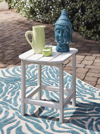 Outdoor table set from Ashley Furniture's Sundown Treasure collection, featuring a table and matching seating for outdoor relaxation.