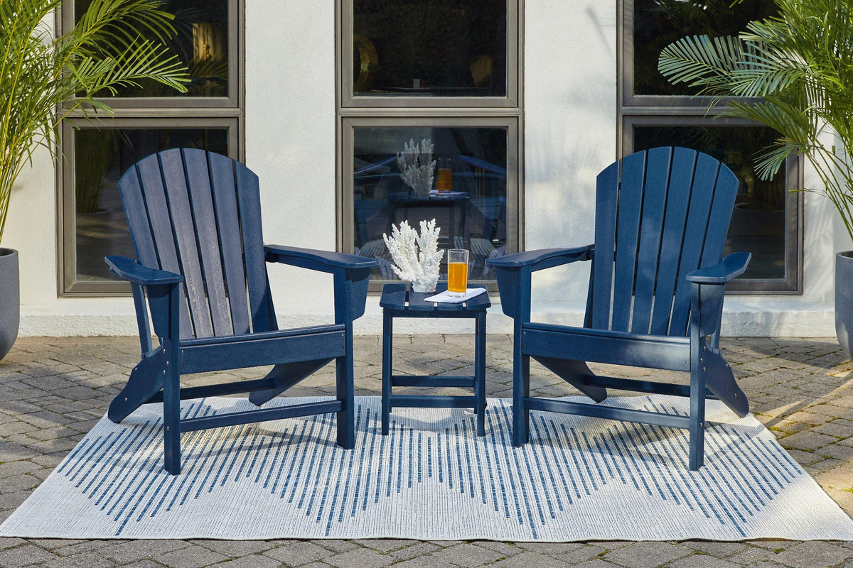 Outdoor seating set with table and chairs from Ashley Furniture, perfect for outdoor dining and relaxing in the yard.
