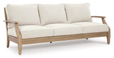 Ashley Furniture Carter Hall outdoor table set featuring a spacious table and matching chairs in a stylish patio design.