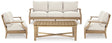 Outdoor table set by Ashley Furniture featuring a wooden table and matching chairs from the Carter Hall collection.